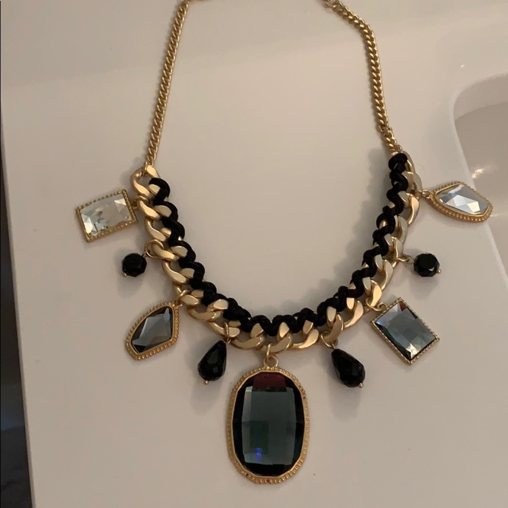 Black and gold necklace and earrings
